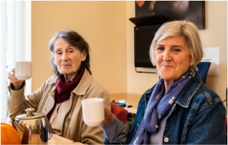 two ladies drinking tea