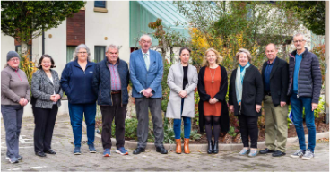 Photo of committee members standing together 