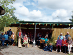 storytelling group sitting outside 